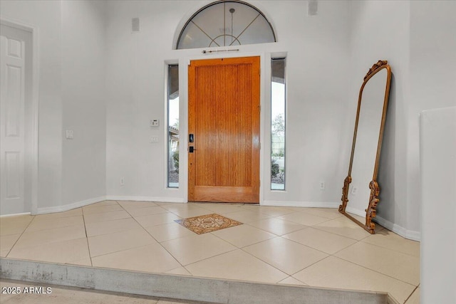 9183 W Shamel Ash Rd, Peoria, AZ 85383 - foyer featuring tile patterned floors and baseboards