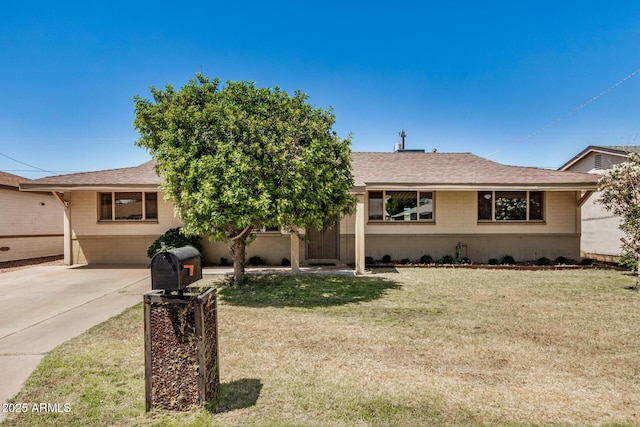 844 E Ruth Ave, Phoenix, AZ 85020 - ranch-style house featuring a front lawn, roof with shingles, and brick siding