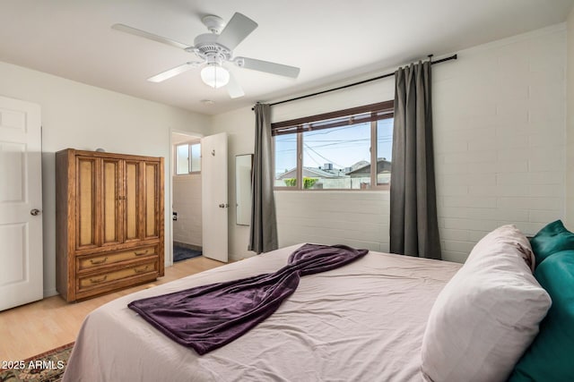 844 E Ruth Ave, Phoenix, AZ 85020 - bedroom with light wood-style flooring and ceiling fan