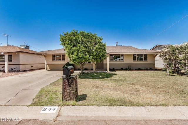 844 E Ruth Ave, Phoenix, AZ 85020 - ranch-style home featuring a front yard and driveway