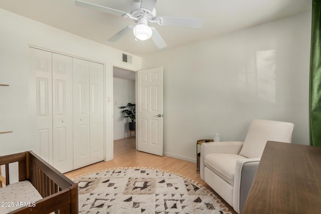 844 E Ruth Ave, Phoenix, AZ 85020 - bedroom featuring light wood-style floors, a closet, ceiling fan, and baseboards