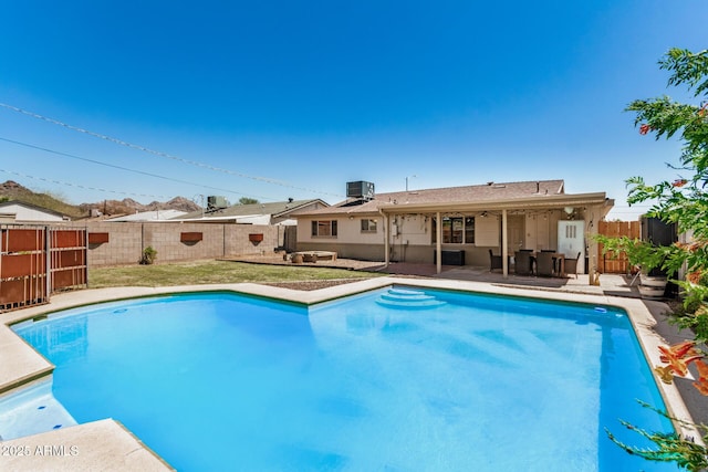 844 E Ruth Ave, Phoenix, AZ 85020 - view of swimming pool featuring central AC unit, a fenced backyard, and a patio