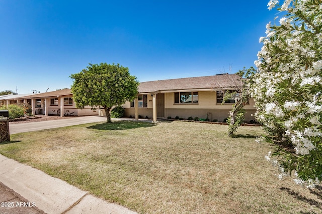 844 E Ruth Ave, Phoenix, AZ 85020 - ranch-style house with a front yard, concrete driveway, and a shingled roof
