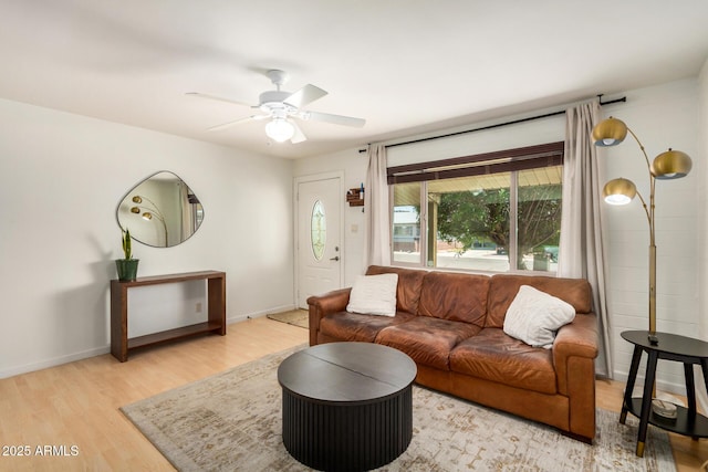 844 E Ruth Ave, Phoenix, AZ 85020 - living room featuring wood finished floors, ceiling fan, and baseboards