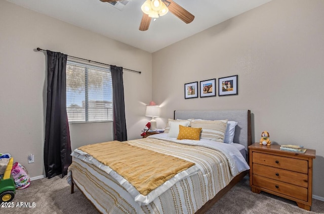 bedroom with carpet, visible vents, and baseboards