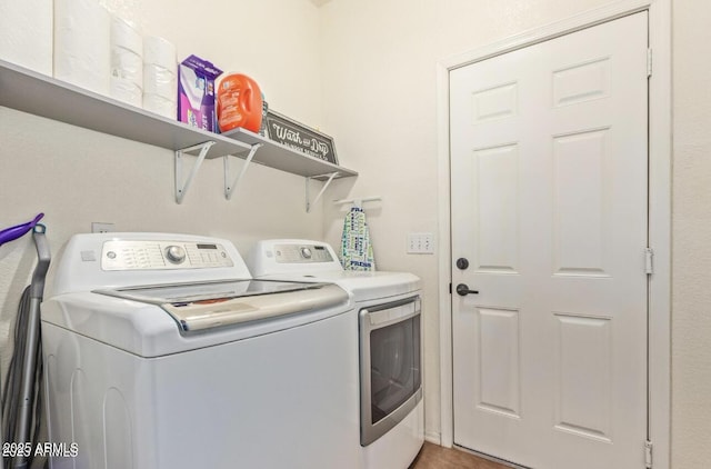 laundry room with laundry area and washer and dryer