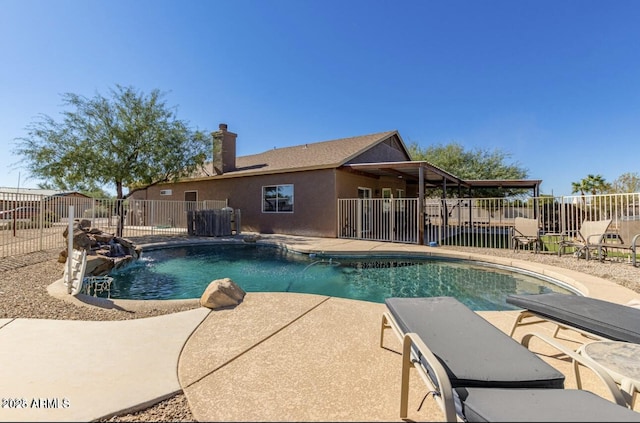 view of pool featuring a patio, fence, and a fenced in pool