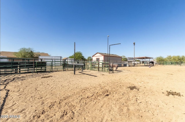 exterior space with a rural view