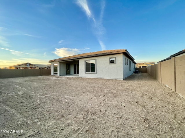 rear view of property with a patio