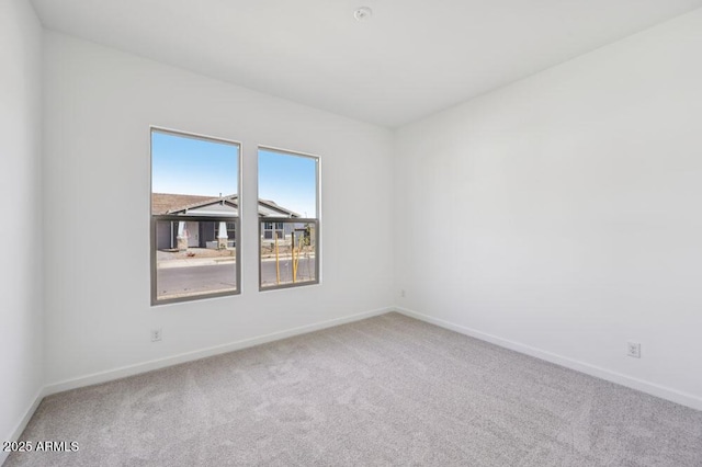 empty room featuring carpet flooring