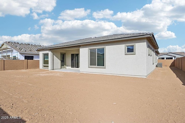 rear view of property with a patio