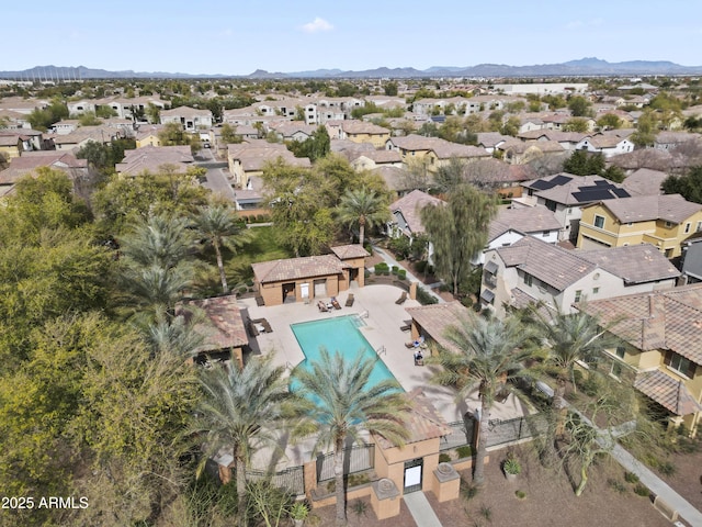 birds eye view of property featuring a mountain view