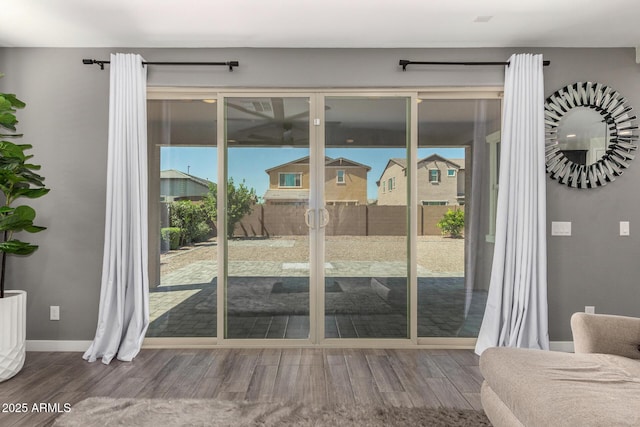 2250 E Palmdale Ln, Gilbert, AZ 85298 - doorway featuring wood finished floors and baseboards