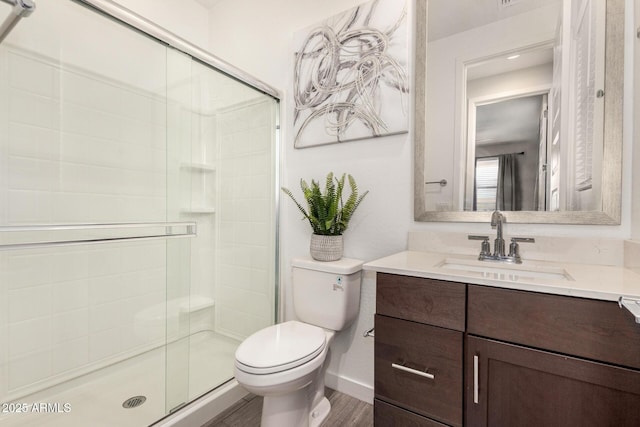 2250 E Palmdale Ln, Gilbert, AZ 85298 - full bathroom featuring toilet, vanity, a shower stall, and wood finished floors