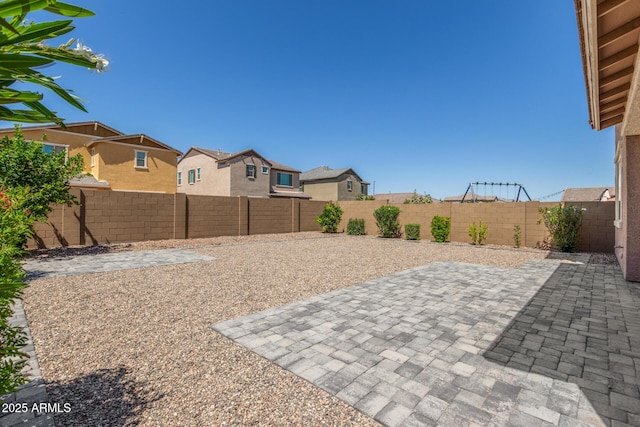 2250 E Palmdale Ln, Gilbert, AZ 85298 - fenced backyard with a patio area and a residential view
