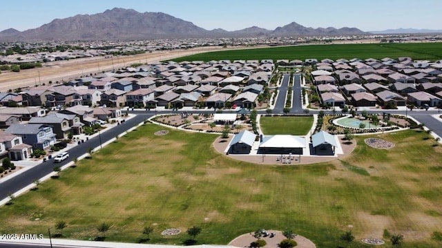 2250 E Palmdale Ln, Gilbert, AZ 85298 - aerial view of property and surrounding area with a mountainous background and nearby suburban area