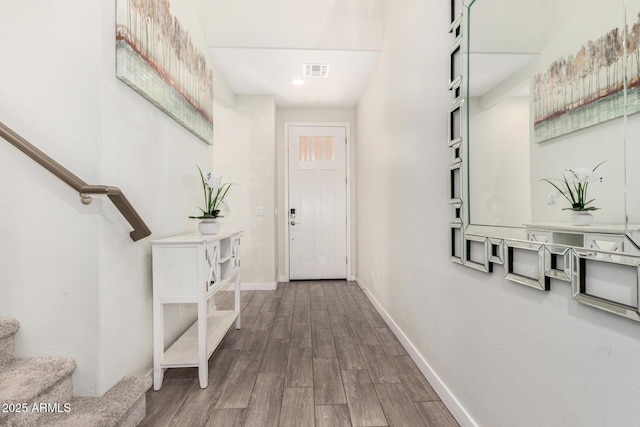 2250 E Palmdale Ln, Gilbert, AZ 85298 - entrance foyer with stairs, wood finished floors, baseboards, and recessed lighting