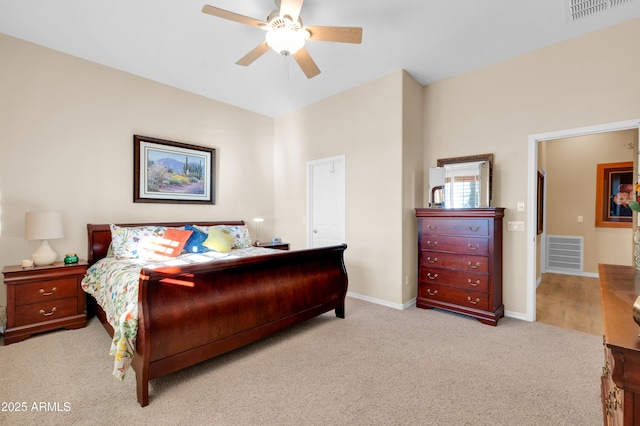 bedroom with light carpet and ceiling fan