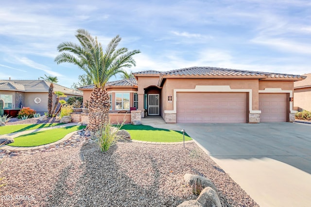 view of front of home with a garage