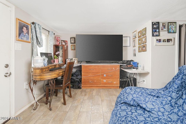 bedroom with light hardwood / wood-style flooring