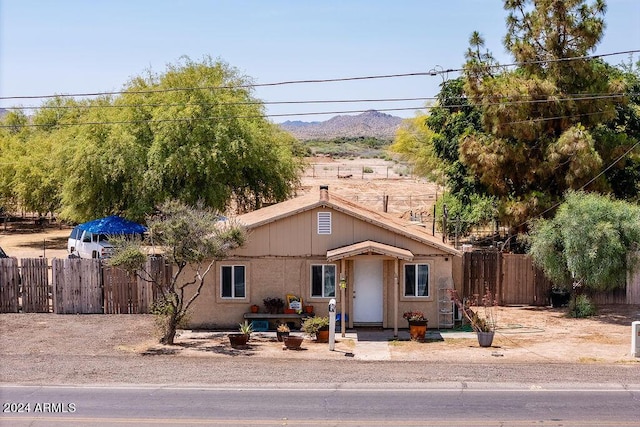 view of front of home with a mountain view