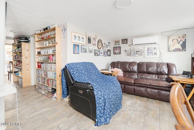 living room featuring a wall mounted air conditioner and hardwood / wood-style floors