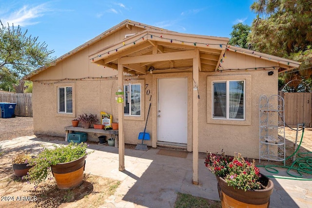 rear view of house with a patio area