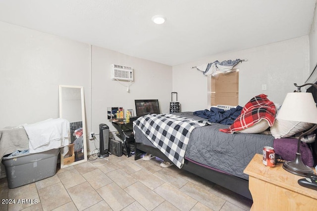 bedroom with a wall mounted air conditioner