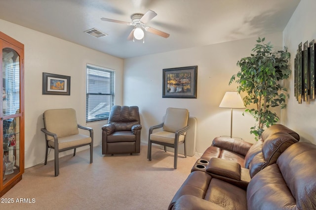 living room featuring ceiling fan