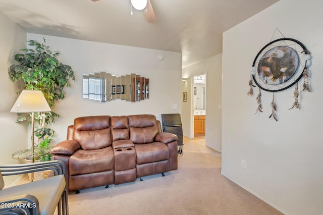 living room featuring ceiling fan and light carpet