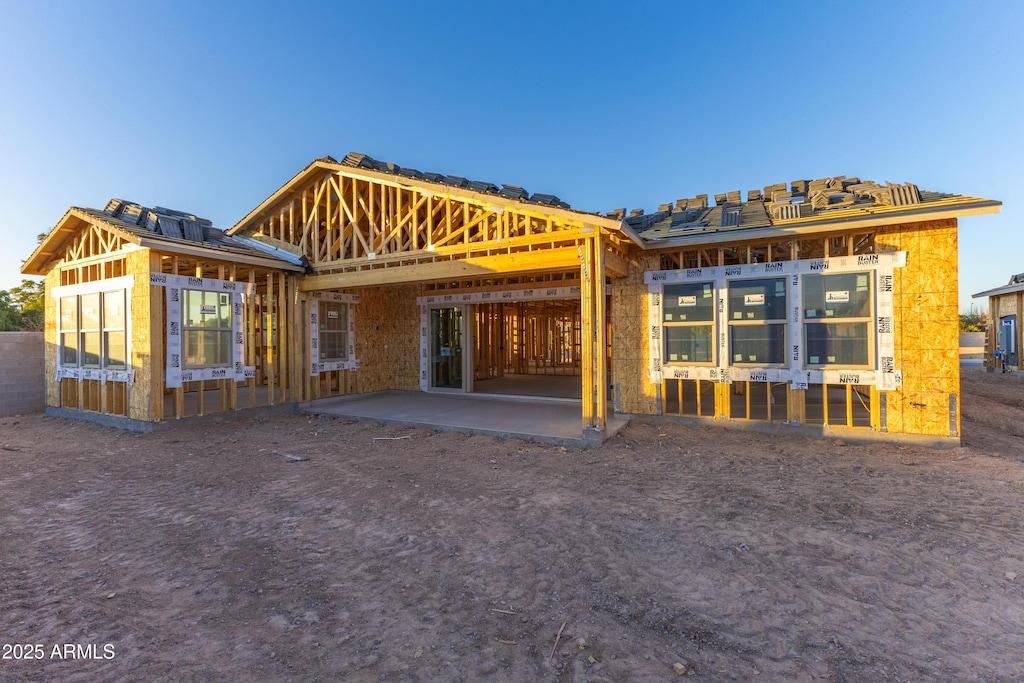 rear view of property with a patio