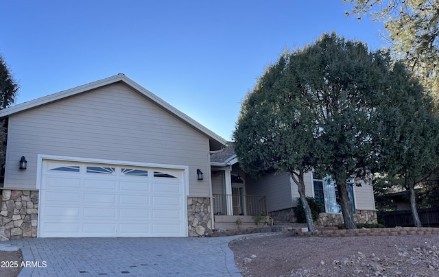 view of front of property with a garage