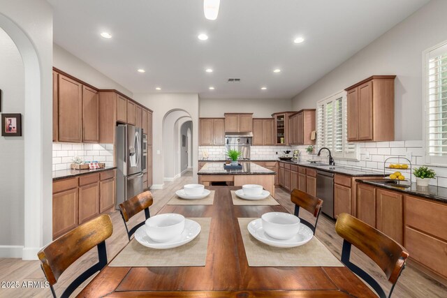 16201 S 29th Ave, Phoenix, AZ 85045 - dining area featuring arched walkways, recessed lighting, light wood-style flooring, and visible vents