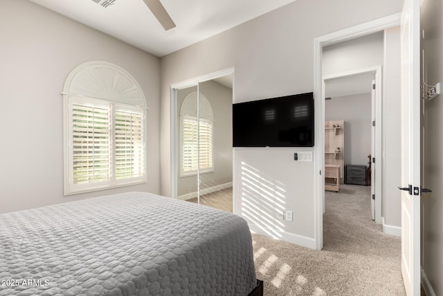 16201 S 29th Ave, Phoenix, AZ 85045 - carpeted bedroom with a ceiling fan, baseboards, and a closet