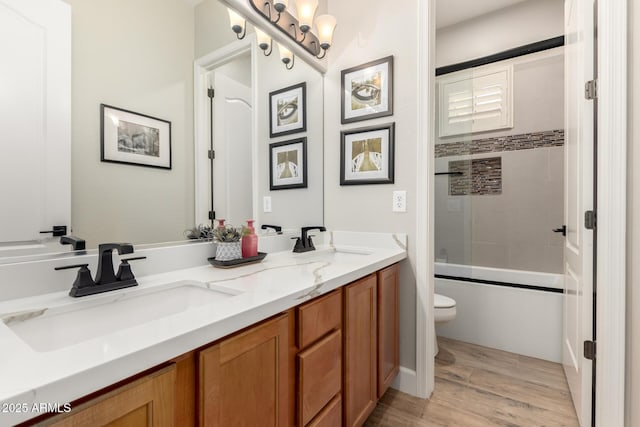 16201 S 29th Ave, Phoenix, AZ 85045 - full bath featuring double vanity, toilet, a sink, and wood finished floors
