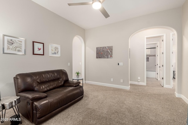16201 S 29th Ave, Phoenix, AZ 85045 - sitting room featuring arched walkways, ceiling fan, and carpet floors