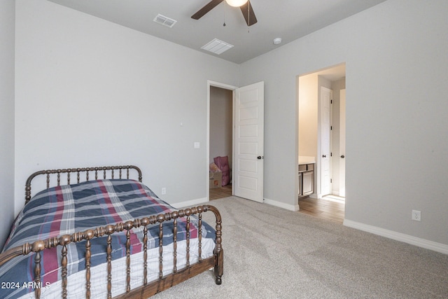 carpeted bedroom featuring ceiling fan