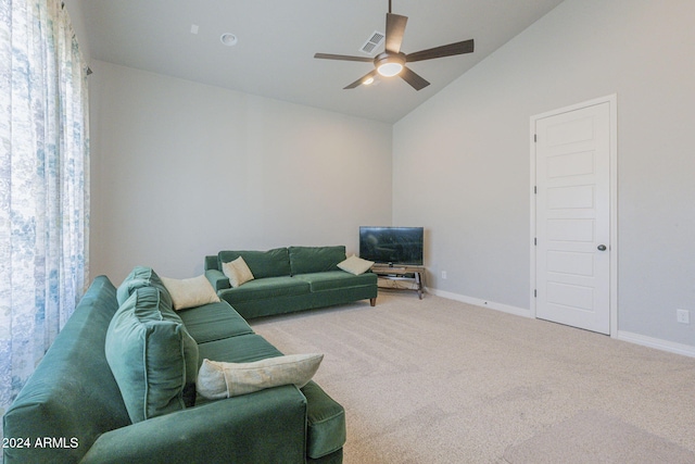 carpeted living room with high vaulted ceiling and ceiling fan