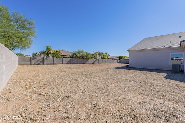 view of yard featuring central AC unit