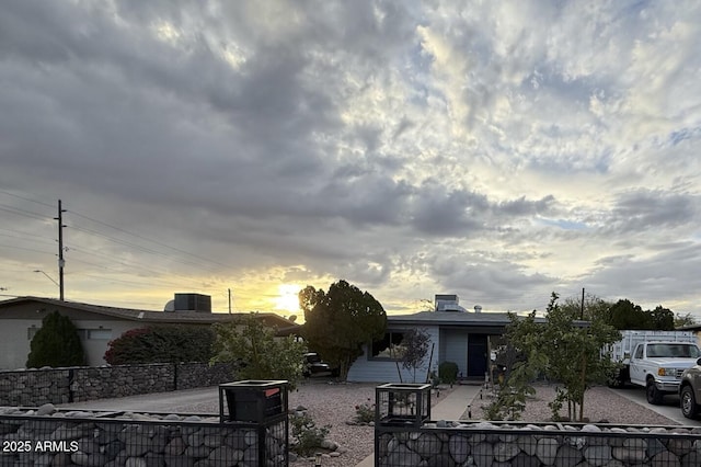 view of front of property featuring cooling unit