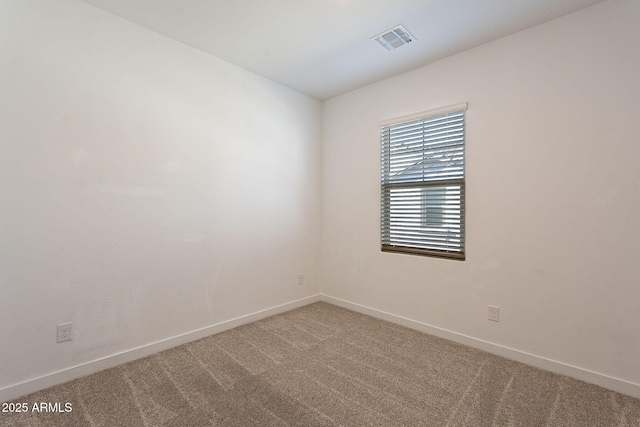 unfurnished room featuring carpet floors