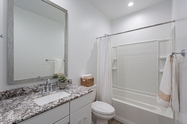 full bathroom featuring shower / bath combo with shower curtain, vanity, and toilet