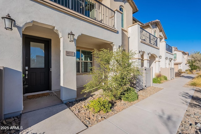 doorway to property with a balcony