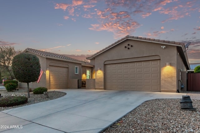 view of front of property with a garage