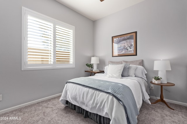 bedroom with light carpet