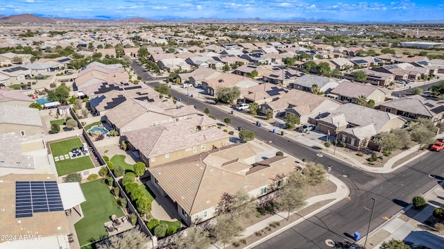 birds eye view of property with a mountain view