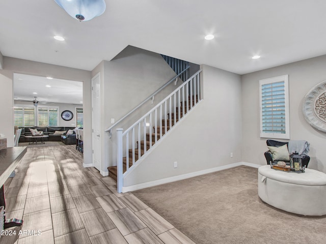 interior space featuring ceiling fan