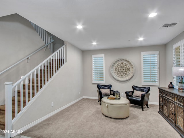 sitting room with light carpet