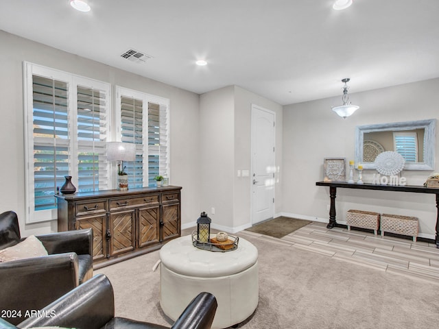 living room with light hardwood / wood-style floors