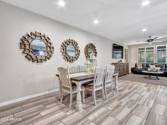 dining space with ceiling fan